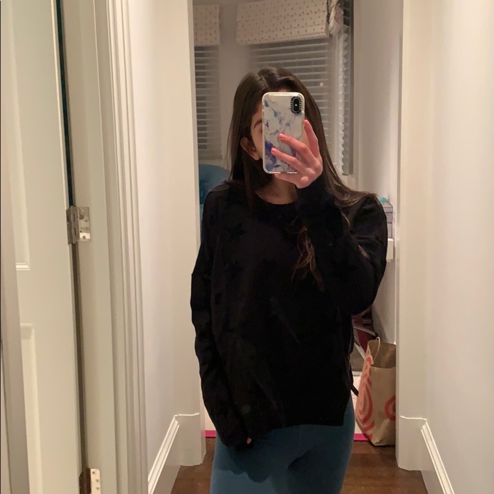 Stars and hearts black sweater.